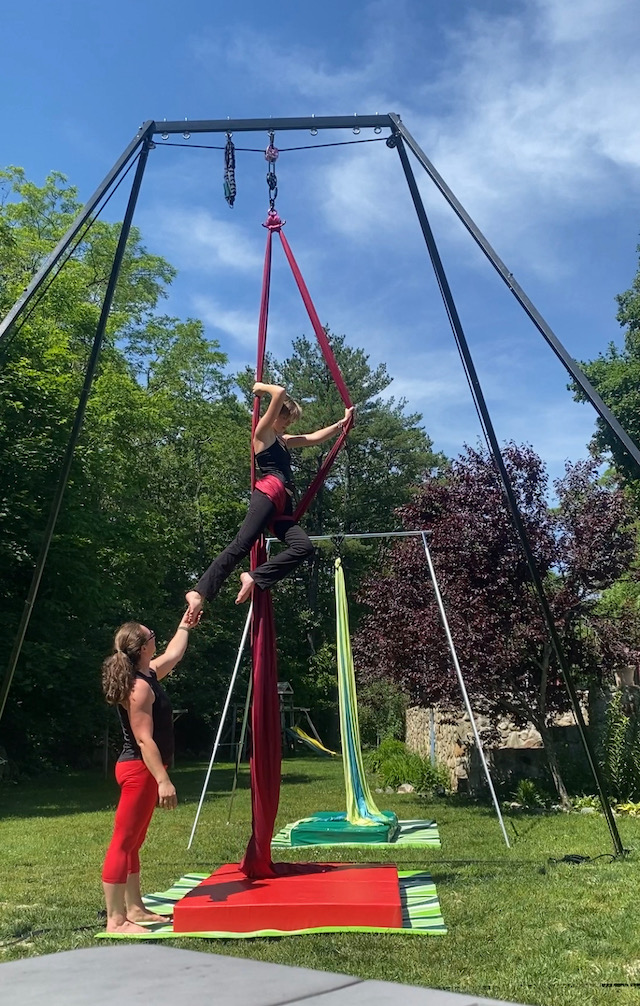 Cait instructs a young student