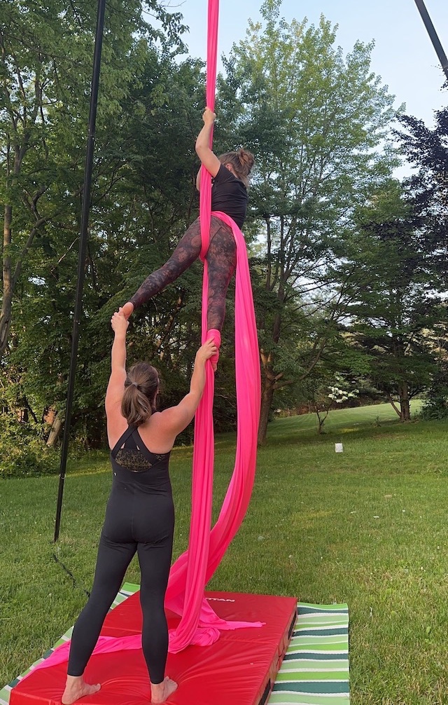 Cait guides a student outdoors